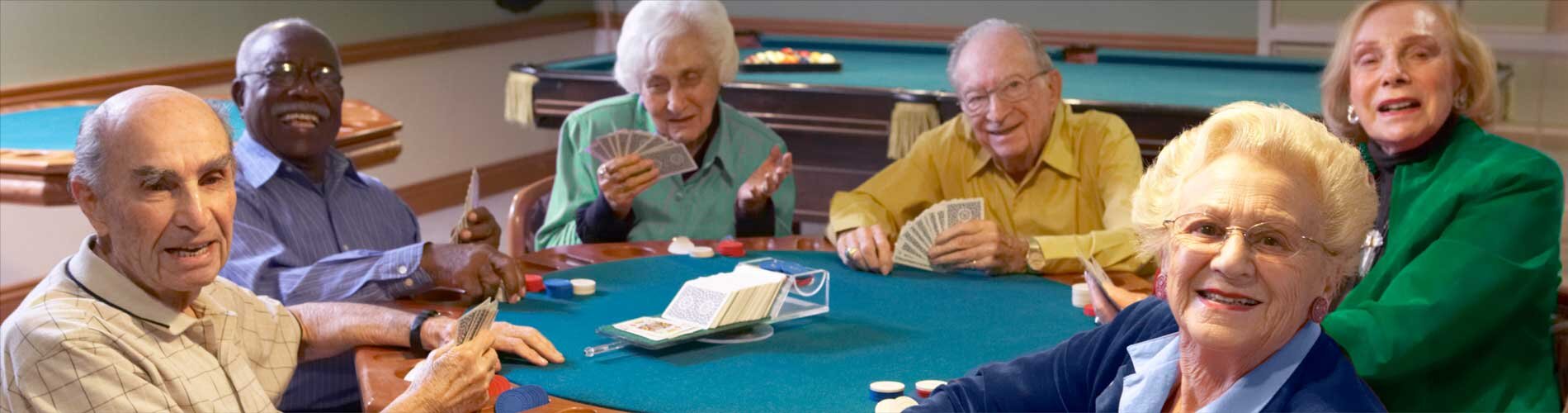 Group of seniors playing cards